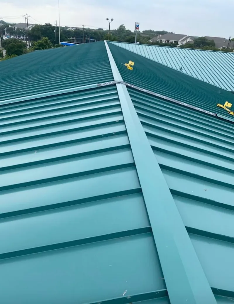 Green commercial metal roof ridge and valley for Metal Roof Repair in Lynn Haven